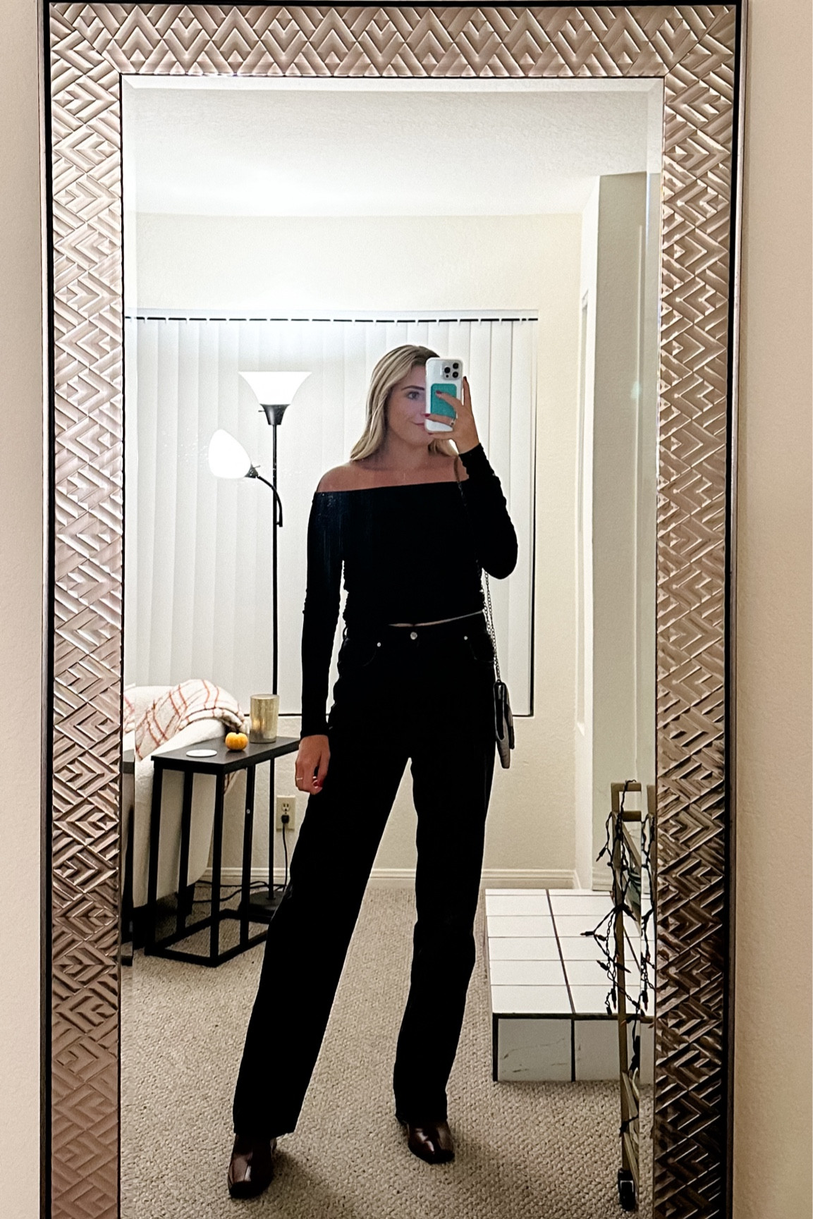 Going out black off the shoulder top & loose Zara jeans with red booties 