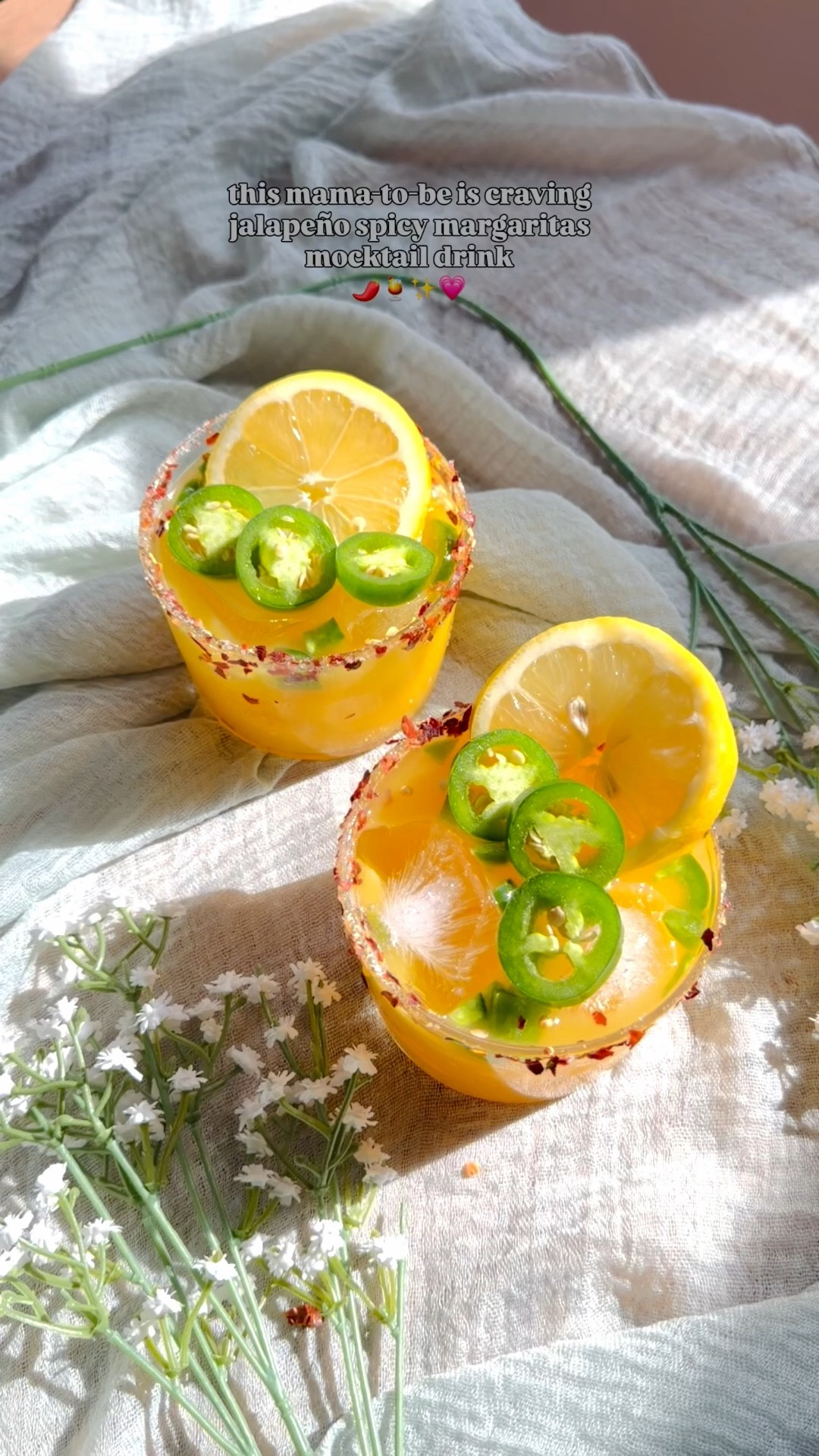 🌞🍹 Mama’s to be craving a spicy margarita as the weather heats up! Nothing like a zesty sip to kick off the fun—it’s my go-to drink of the season! Cheers to warmer days! 🌶️✨ 

Ingredients:
- Jalapeño slices 
- 1/2 oz agave 
- 1/2 oz lime juice 
- Orange juice  @tropicana_juices 
- Top with more jalapeños & lime slices 

#MargaritaMagic #CheersToSummer #Pregnancy #Mocktail #Jalapeno

#LTKfoodie #LTKHome #LTKBump