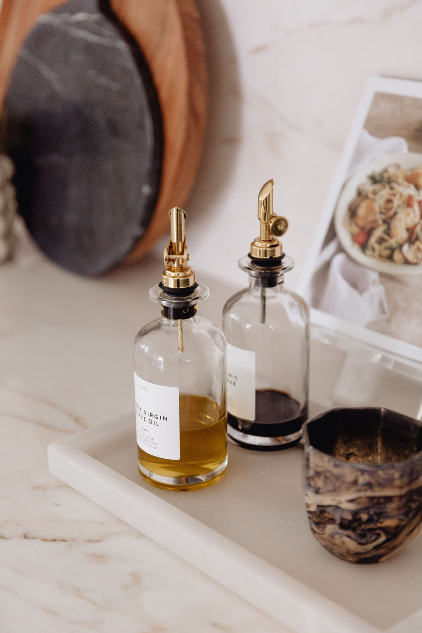 Kitchen // kitchen decor, countertop decorative objects, utensil holder, bar stools, kitchen table, dining nook, dining chairs, modern home decor, modern decor, tablescape, modern home decor, neutral home decor, dining room, dining room decor, neutrals, neutral home, decor, modern, minimalist, minimalist style, wall hanging decor, boho decor, neutrals, interior, interior design

#LTKhome