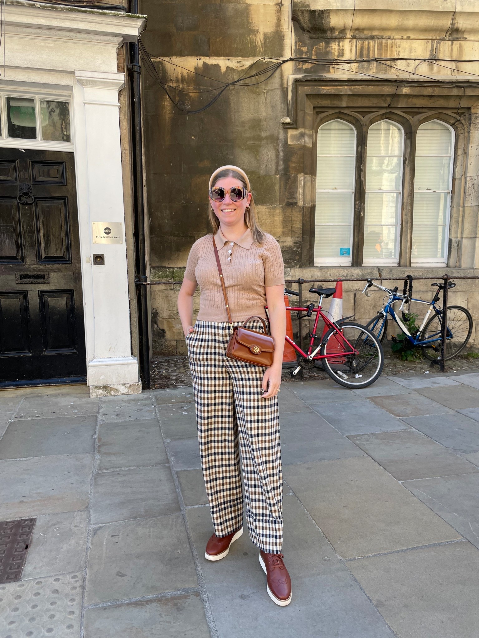 What I wore in York, England in spring. A pair of plaid trousers and a knit polo made for the perfect spring outfit. Don’t forget comfortable shoes for walking on cobblestone streets!

#LTKSeasonal