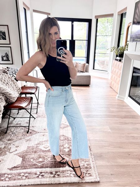 The perfect vintage wide leg cropped jeans. I’m wearing a size 26 in these. Tank true to size 

#LTKOver40 #LTKStyleTip #LTKxMadewell