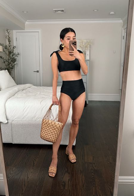 Up to 50% off at J.Crew . Best bikini bottoms and also linked my two tank tops on heavy rotation this spring and summer! 

•J.Crew bikini ruched bottoms xxs - these bottoms are super flattering esp if you’re looking for a suit that is comfortable over a bit of a tummy! Not skimpy on the rear coverage either.

•J.Crew scoopneck bikini top xxs - fit on the top is good but I preferred the regular square neck top linked. fYI the shoulder ties are decorative, not adjustable and there are removable small bust pads. 

I ended up keeping the regular square neck bikini top as well. Note it’s a shallower bust coverage top so I sized up to an XS in the square neck.

Also tried on the other black swim top styles linked which are flattering on small busts 

•J.Crew woven basket bag now on major sale

•Sam Edelman sandals sz 5

•Sezane earrings 

#petite black bikini swimsuit 

#LTKshoecrush #LTKtravel #LTKswim