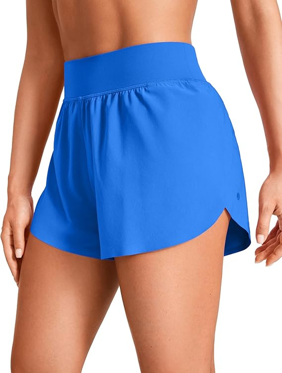 CRZ YOGA High Waisted Dolphin Athletic Running Shorts for Women 3" High Split Comfy Mesh Liner fo... | Amazon (US)