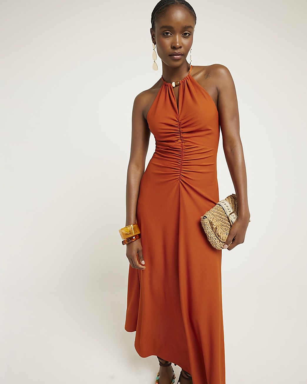 Rust ruched halter neck bodycon maxi dress | River Island (UK & IE)