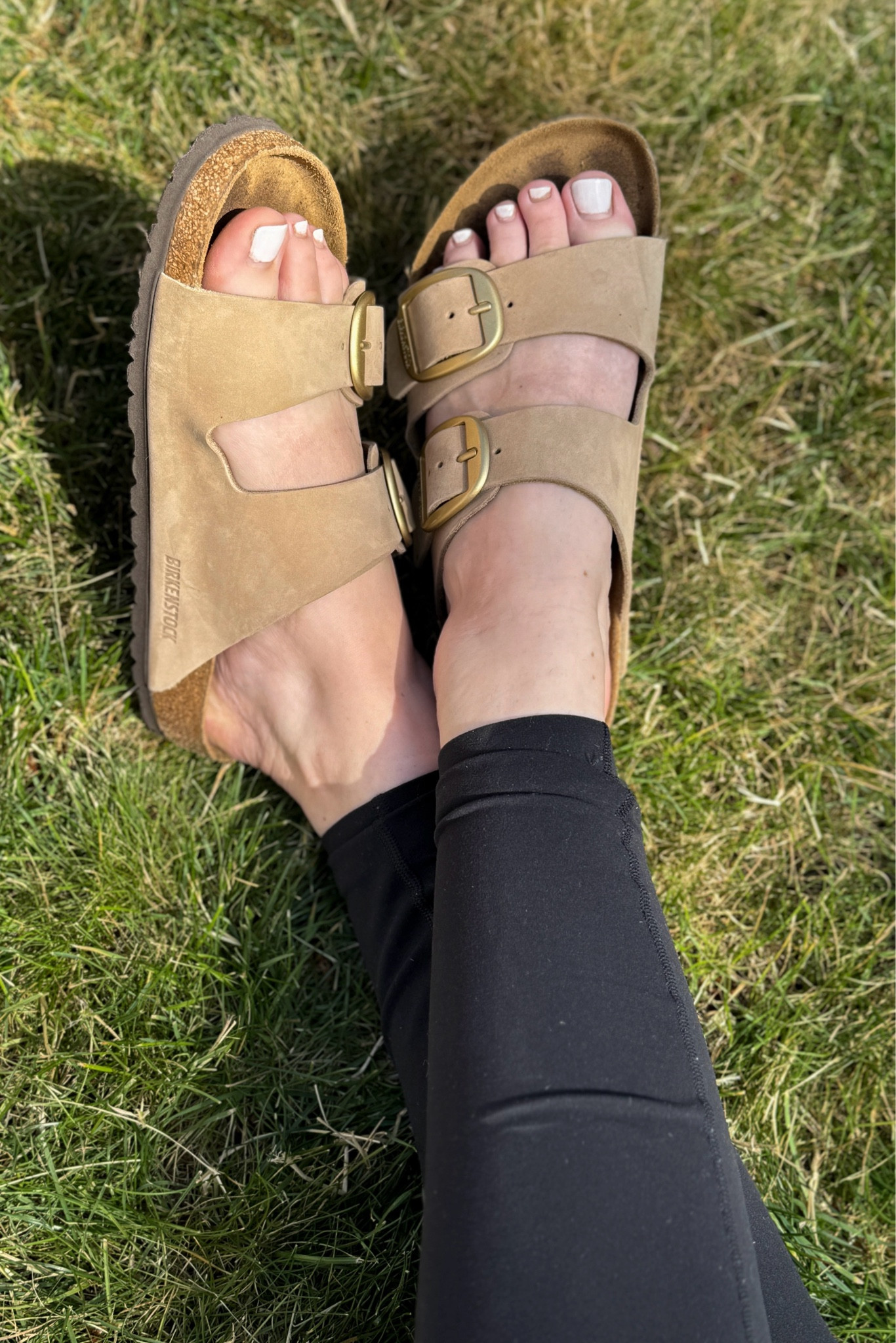 I never thought I’d be a Birks girlie, but here we are! They are so easy to slip on and were especially supportive for my feet / posture while pregnant and I am continuing to love them into postpartum life. The Arizona Big Buckle sandals in Sandcastle Nubuck are the perfect addition to my wardrobe because they’re not *too* hippie with the neutral color and fancier gold hardware.

I will say that while the cork sole is supportive, it’s quite firm so if you prefer a softer footbed these may not be the best option for you.

#LTKShoeCrush