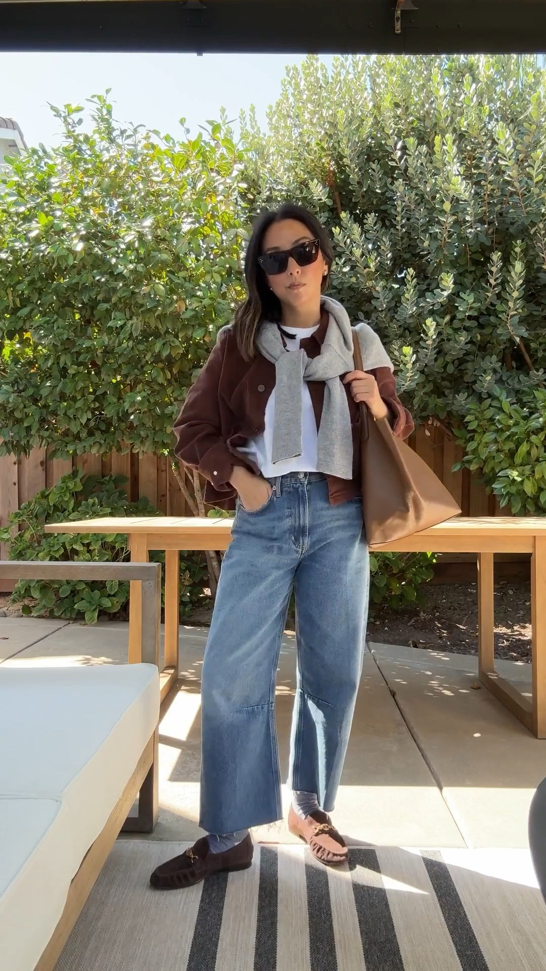Todays #ootd took at a coffee shop. How to wear barrel jeans. These are my go-to jeans right now. So comfy. 

J.crew sing jacket small
Madewell tee xs
Citizens of humanity Miro jeans 25, cut hems
Sam Edelman  loafers 5
Madewell socks (old)
Celine sunglasses 
Mansur Gavriel tote 

Fall outfits, fall style, petite style, jeans 

#LTKShoeCrush #LTKPetite #LTKSeasonal