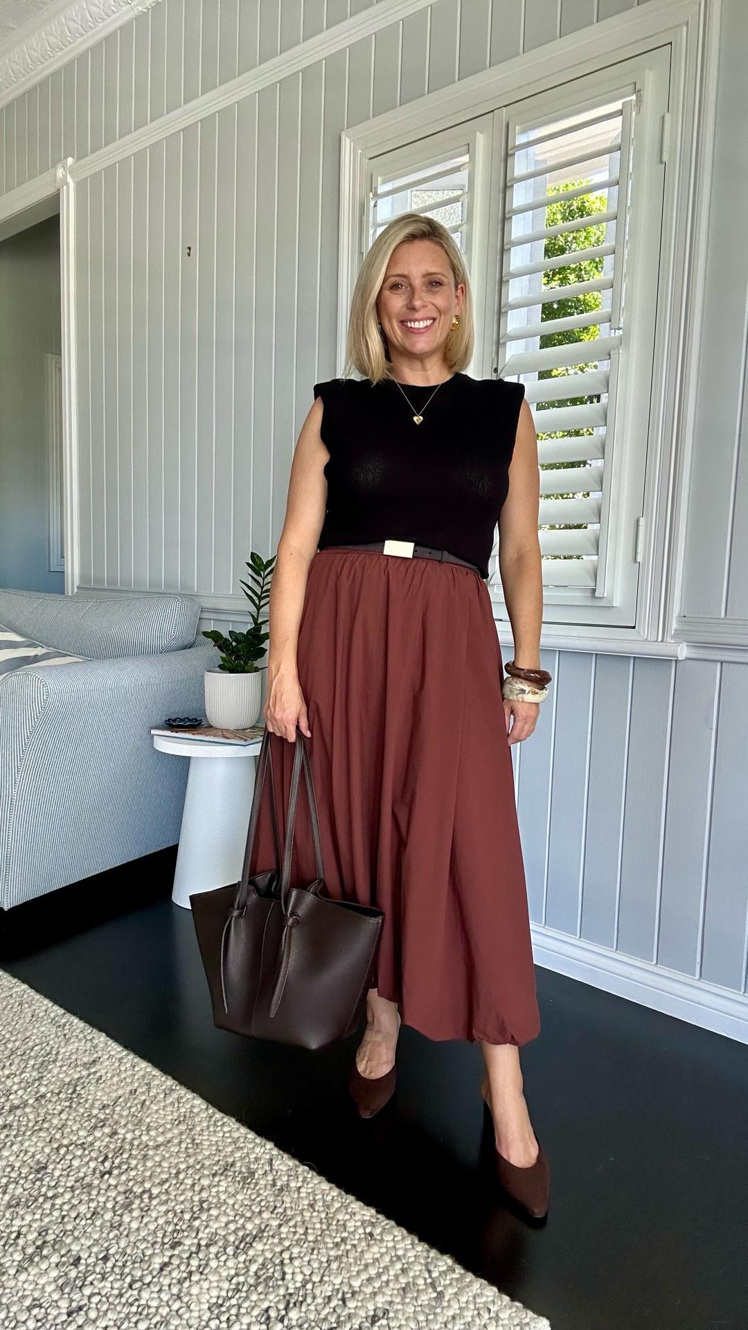 I love this bubble skirt - the elongated length feel elegant and I’ve paired it with this lightweight knit which has light shoulder pads which gives it structure and add extra structure and breadth to the shoulders creating an hourglass silhouette. 

Knit: size M 
Skirt: 12 (I probably could fit a 10 as it has elastic at the back).  

#LTKaustralia #LTKworkwear
