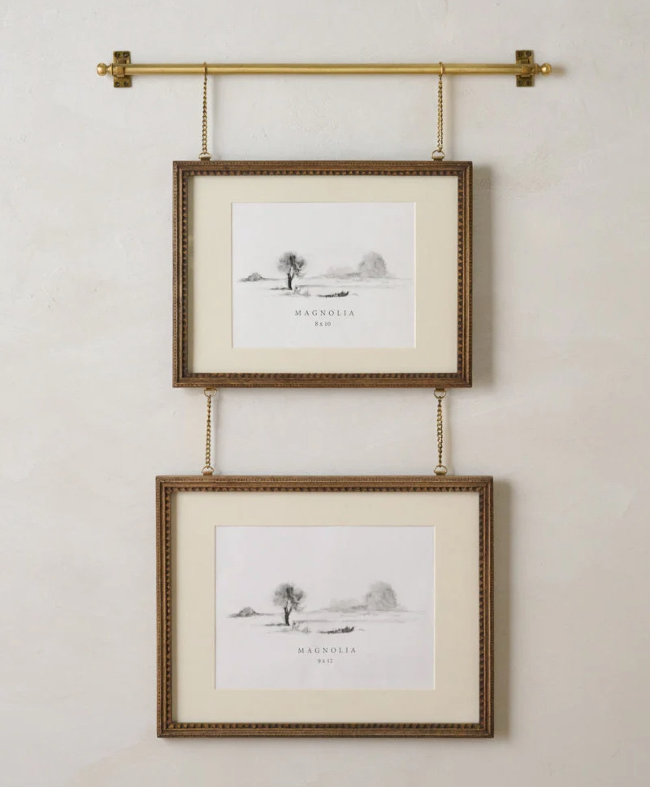 Colleen Wood and Brass Rail Double Picture Frame
**MEMORIAL DAY SALE**
Reminds me of the series POLDARK and how they used to hang paintings! 

Inspired by the charm of English‑style hanging frames, the Colleen Wood and Brass Rail Double Picture Frame offers a beautifully layered way to display the artwork and moments that give your home its story. This piece blends warm materials and thoughtful craftsmanship to create wall décor that feels both classic and personal.