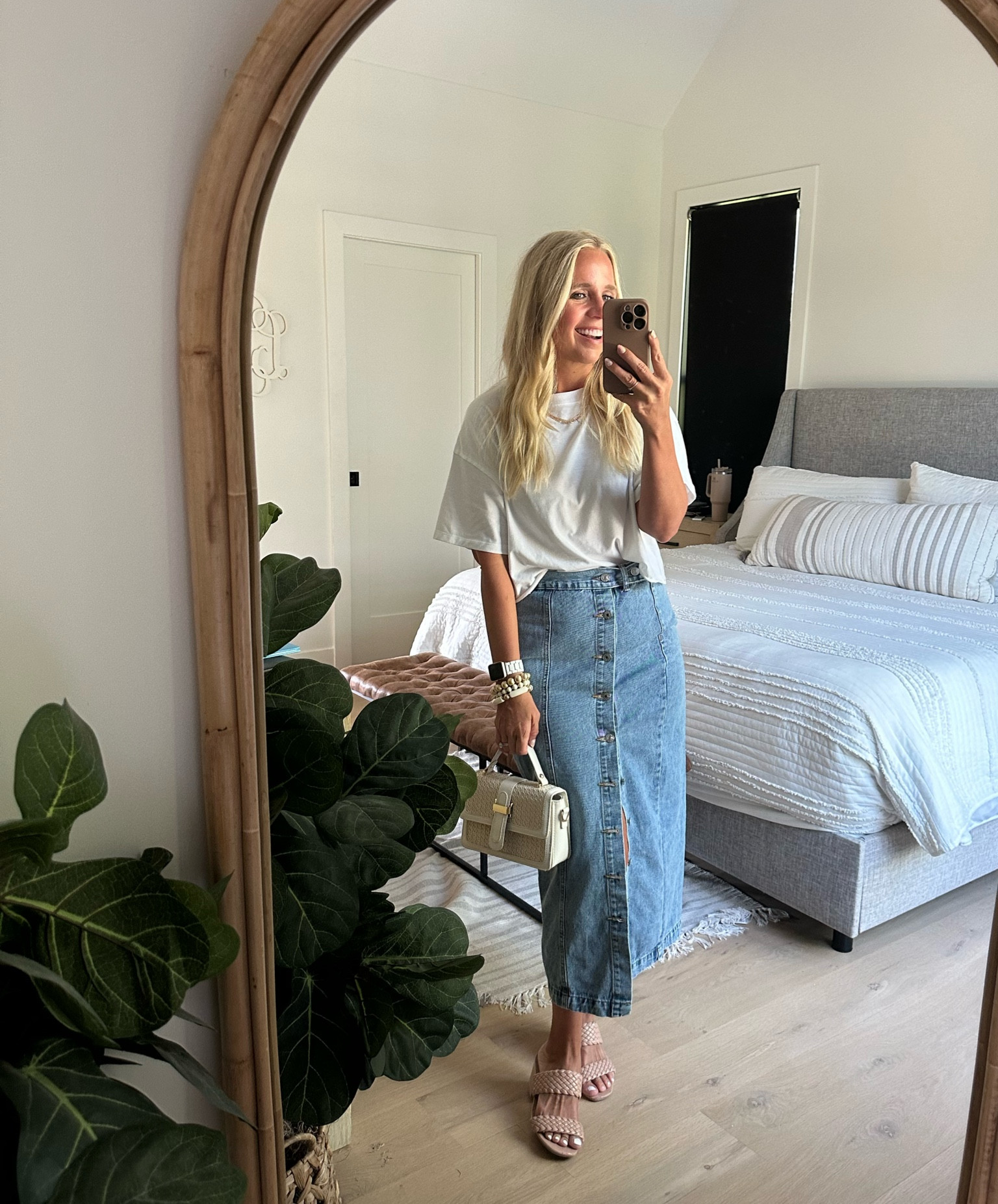 How are you feeling about the denim skirt trend? I love it and think it will be cute as we transition to fall. T-shirt is from Target. Wearing a medium in the t-shirt and skirt. 

#LTKunder100 #LTKsalealert #LTKunder50