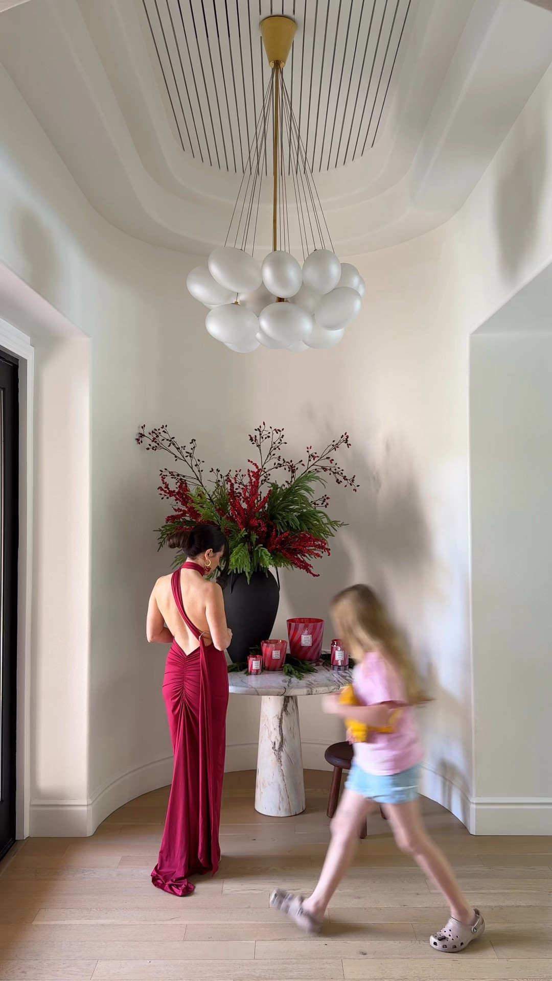 BTS - red dress, red earrings, holiday decor