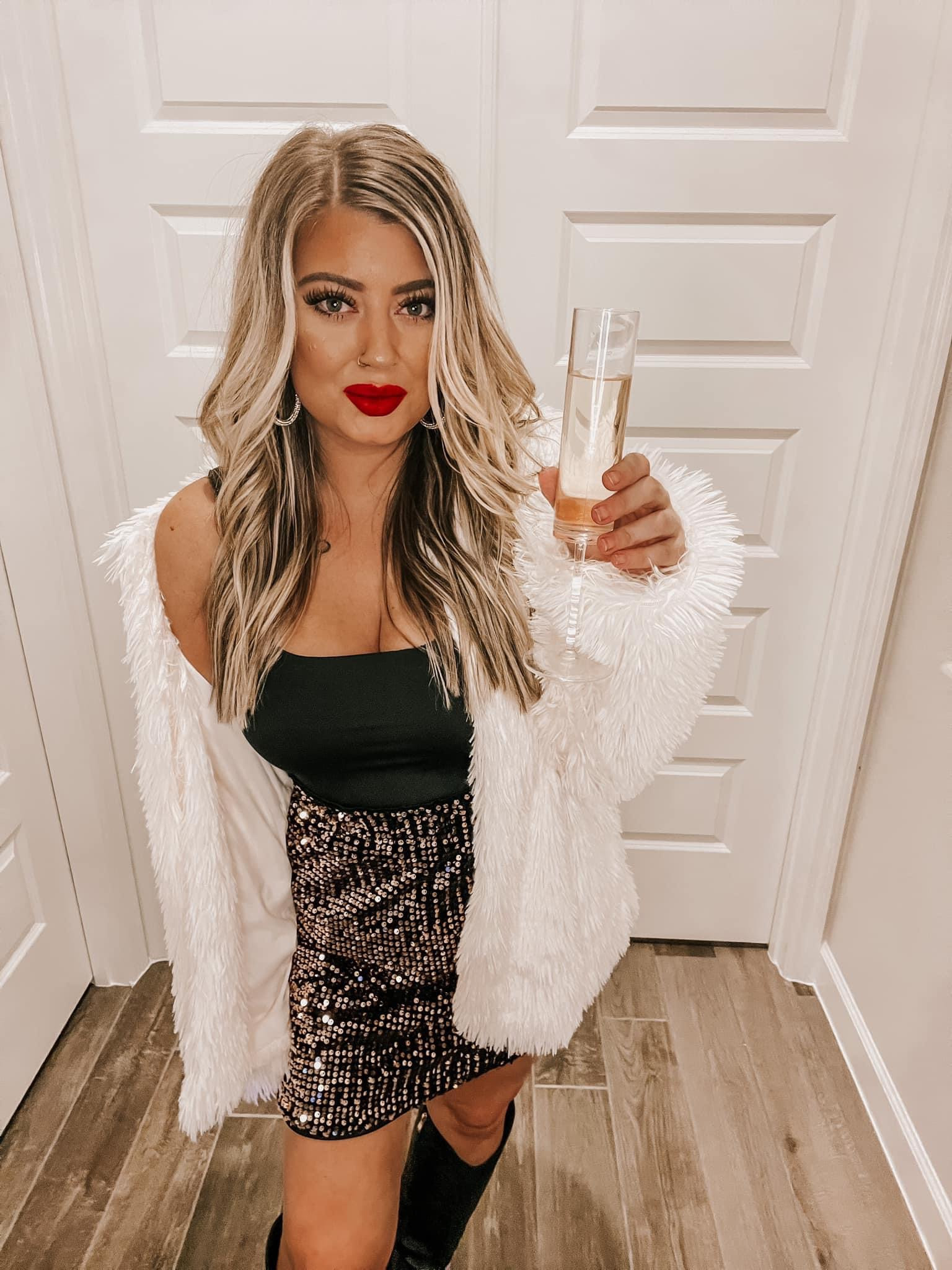 Festive holiday outfit or anytime you want to be a little extra! Sequin skirt & fur 