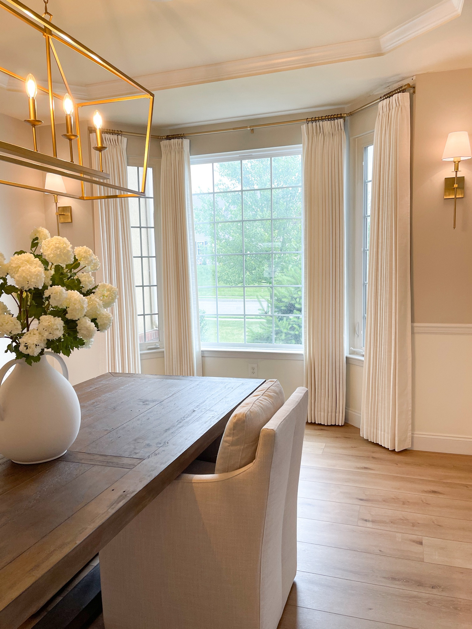 Dining room custom curtains! 

✨ Curtain details:
Product name : Liz linen collection 
- Color : ivory white 
- Header style : Triple pleated 
- Single panel width and length in inches : 
• 98 inches L x 55 inches W
• 98 inches L x 60 inches W 
- Liner type : privacy white liner  
- Memory Shape: YES

Use code: COZYWITHKATE to save! 💰

#LTKSaleAlert #LTKHome #LTKStyleTip