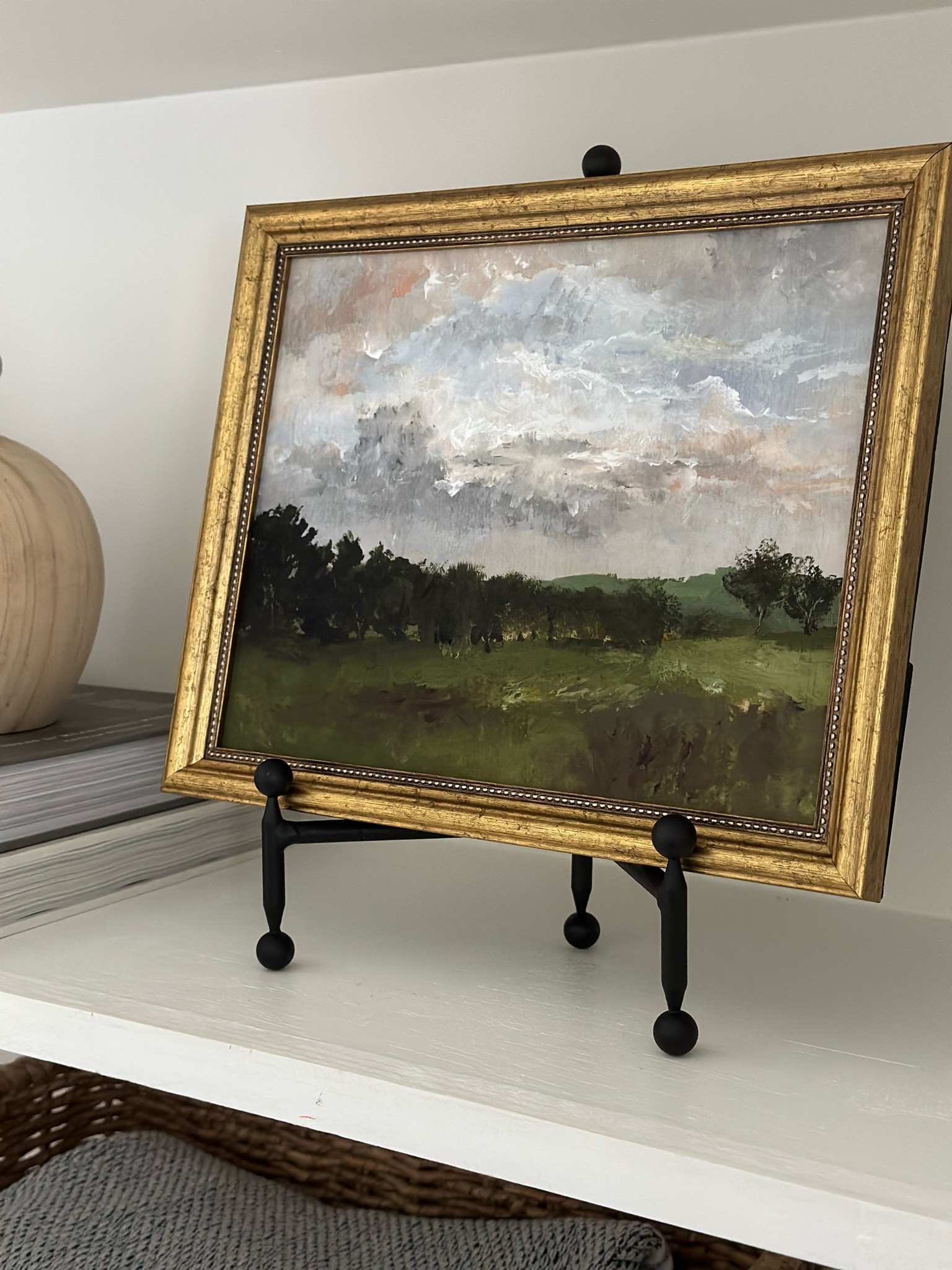 Shelf styling // Art Easel // Art // Vintage Art // Landscape Art // Shelfie

#Shelfstyling
#ArtEasel 
#Art 
#VintageArt 
#LandscapeArt
#Shelfie

#LTKstyletip #LTKhome #LTKSeasonal