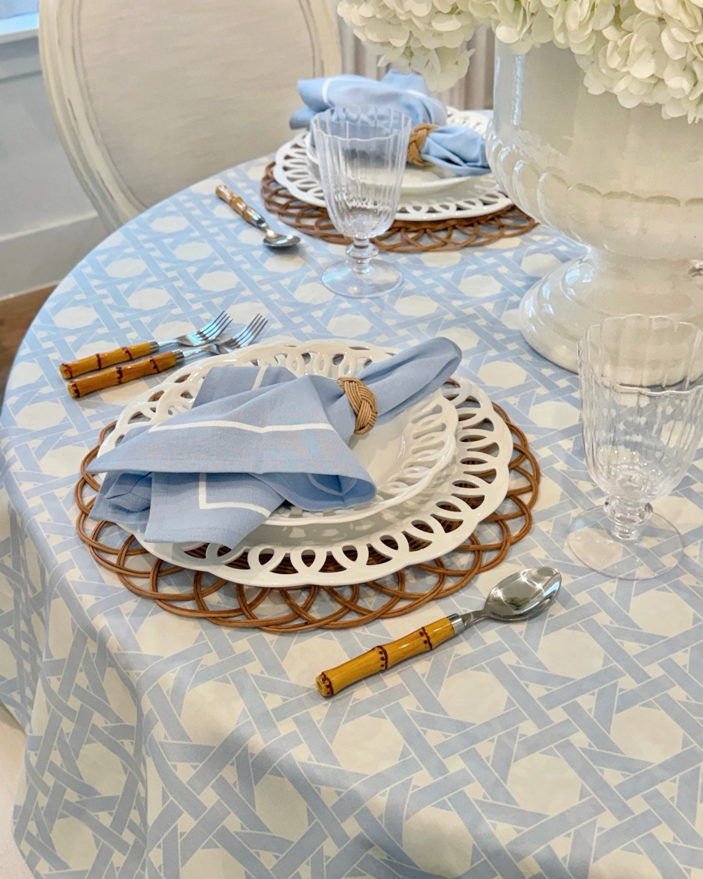My Spoonflower order finally arrived last weekend and it was absolutely worth the wait! 💙 This beautiful blue cane tablecloth took over 3 weeks to arrive, and I’m so glad I was patient—it turned out even better in person! It’s 20% off right now and customizable. I also picked up these gorgeous pillows from Homesense last month—layering them in really brought this space together beautifully. And definitely check your local @Homesense for the new Sanderson pillows—so beautiful and all under $50! 😍 

#springdecor #springtablescape #traditionalhome #coastaldecor #amazonfinds coastal decor Serena and Lily blue and white blue cane print tablecloth pillow covers traditional decor elegant home chic decor spring decor summer tablescape tjmaxx Walmart target

#LTKHome #LTKSaleAlert