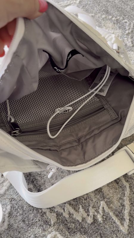 This Athleta belt bag has been such a hit, and I’ve gotten so many questions about the inside… so here it is! This is such a great casual purse, especially for a busy mom like me who is constantly on the go. It’s spacious and lets you be hands free. It’s currently on clearance for $35 in this color. Other colors are also available and on sale, just not on clearance. Click to see and shop before they’re gone! 

#LTKsalealert #LTKActive #LTKfindsunder50