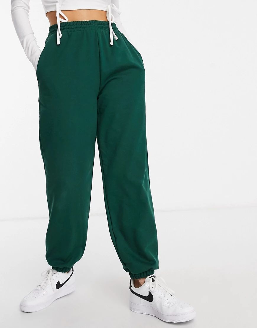 ASOS DESIGN lounge co-ord oversized sweatpants with contrast ties in green | ASOS (Global)