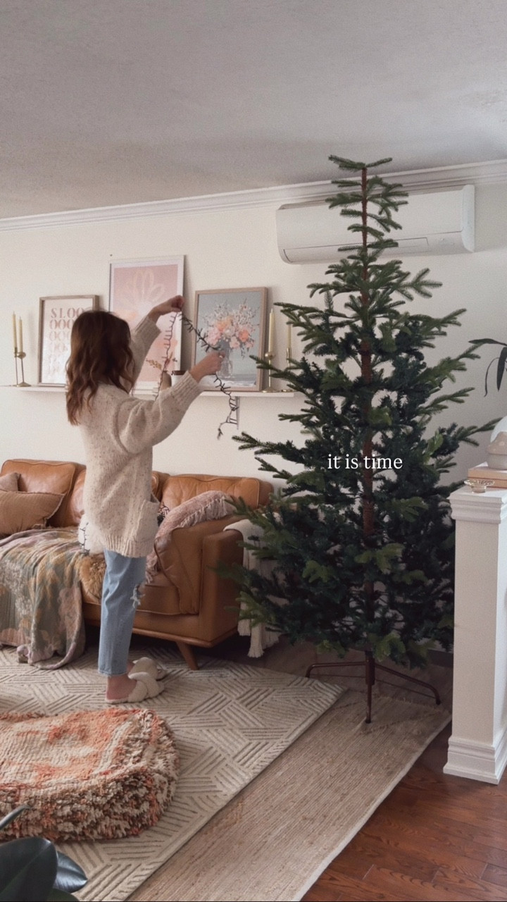 and she’s up!! 🥹🎄
 
#holidaydecor holiday decorating #christmasdecorating christmas decor #livingroomdecor twinkle lights #cozyhome holiday living room #interiorstyling

#LTKHome #LTKHoliday