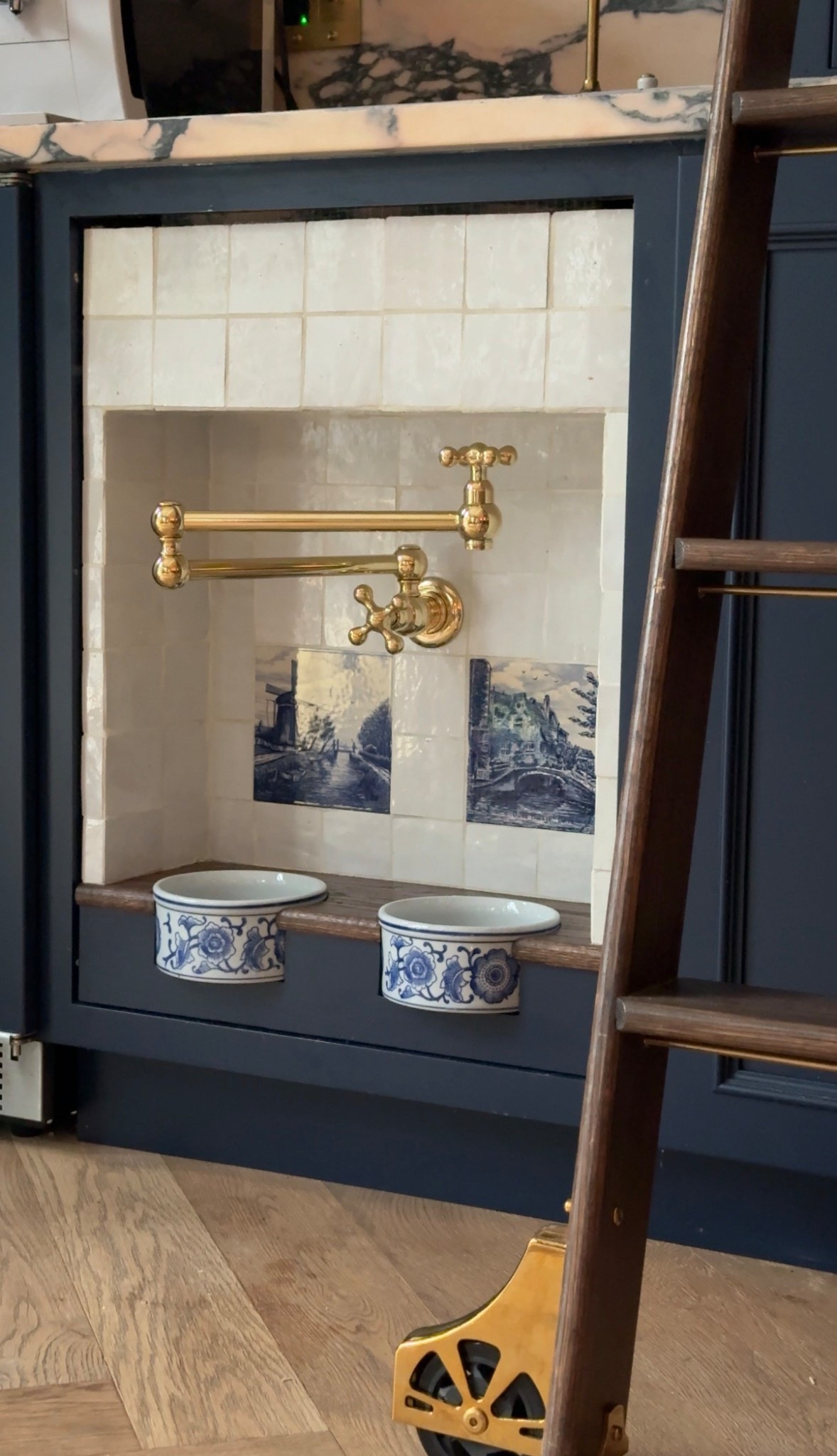 Delft tiles were thrifted and the zellige tiles are “Snow White” from
Riad Tile