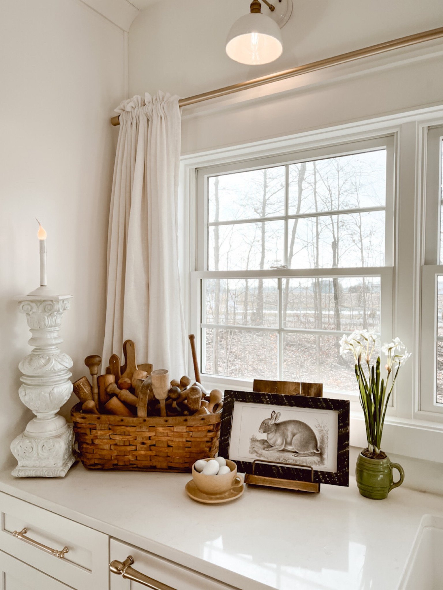 I love vintage rabbit print in this cozy corner of the kitchen.

Vintage rabbit print, rabbit print, bunny print, vintage bunny print, vintage kitchen, home decor, spring decor, spring kitchen, cozy kitchen, curtains, Deb and Danelle

#LTKSeasonal #LTKhome #LTKFind