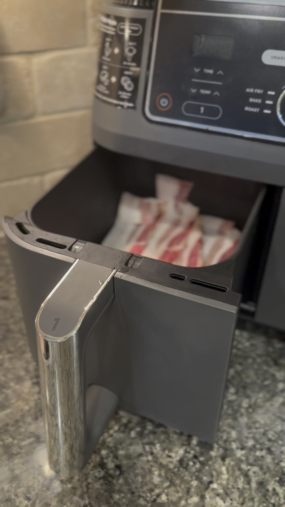 Ninja air fryer! Two compartments. Cooking appliances. Amazon finds. I like to air fry regular cut bacon at 360 degrees F for 7-9 minutes. 

#LTKHome #LTKSaleAlert #LTKVideo