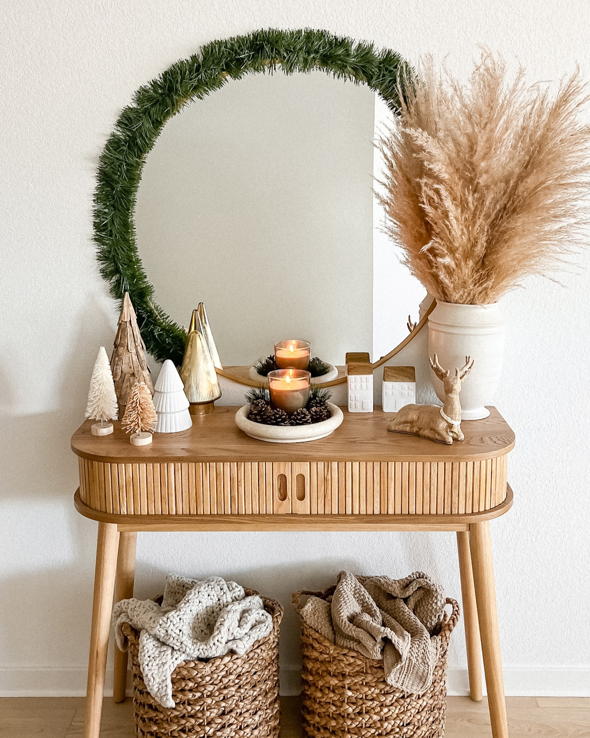 Christmas entryway table decor. Minimal & neutral with a pop of green.

// #ltkseasonal #ltkunder50 #ltksalealert holiday decor, holiday decorations, garland, pampas, tan and white, Christmas decor, Christmas decorations, mini Christmas trees, tiny houses, reindeer, baskets, throw blankets, Target, Amazon

#LTKunder100 #LTKhome #LTKHoliday