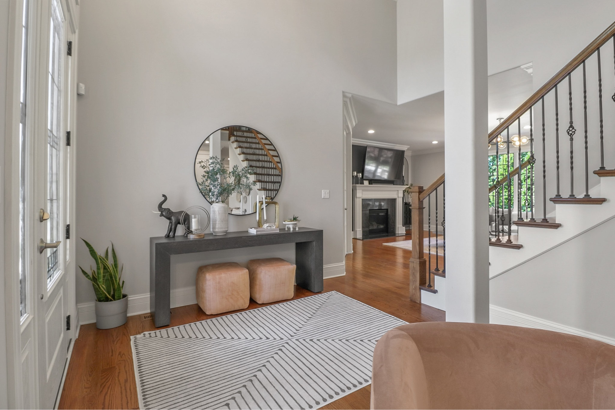 foyer, front room, rug, round mirror, art, sculpture, plant, seating, stool, candle, table decor

#LTKstyletip #LTKhome