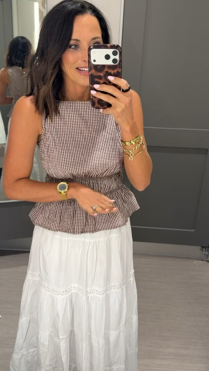 This outfit feels straight out of a Pinterest board 🤎🤍 I’m obsessed with this gingham top — the fit is SO flattering and the little peplum detail makes it feel extra feminine. Paired with this flowy white skirt gives the prettiest effortless summer look. 

This is one of those outfits that looks super elevated but still feels lightweight and comfy. Perfect for brunch, vacation, church, farmers markets, or summer date nights ✨ Target has seriously had the cutest pieces lately. 

Size XS, 5’3 for reference