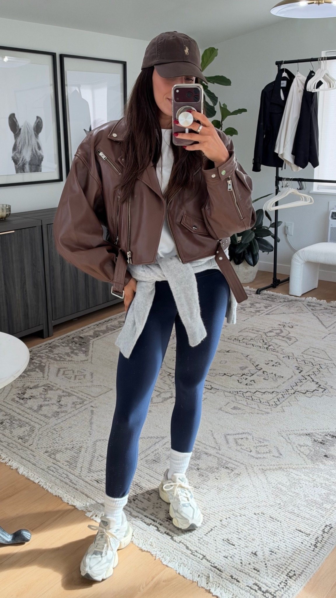 Brown + navy is the color combo you didn't know you needed 🤎💙 

A brown leather moto jacket, navy leggings, a white tee, a grey sweater tied at the waist, a brown ball cap, white crew socks, and chunky white sneakers. An easy, elevated athleisure look. Shop the look below!

#LTKstyletip #LTKSeasonal #LTKfit #LTKshoecrush #LTKfindsunder100