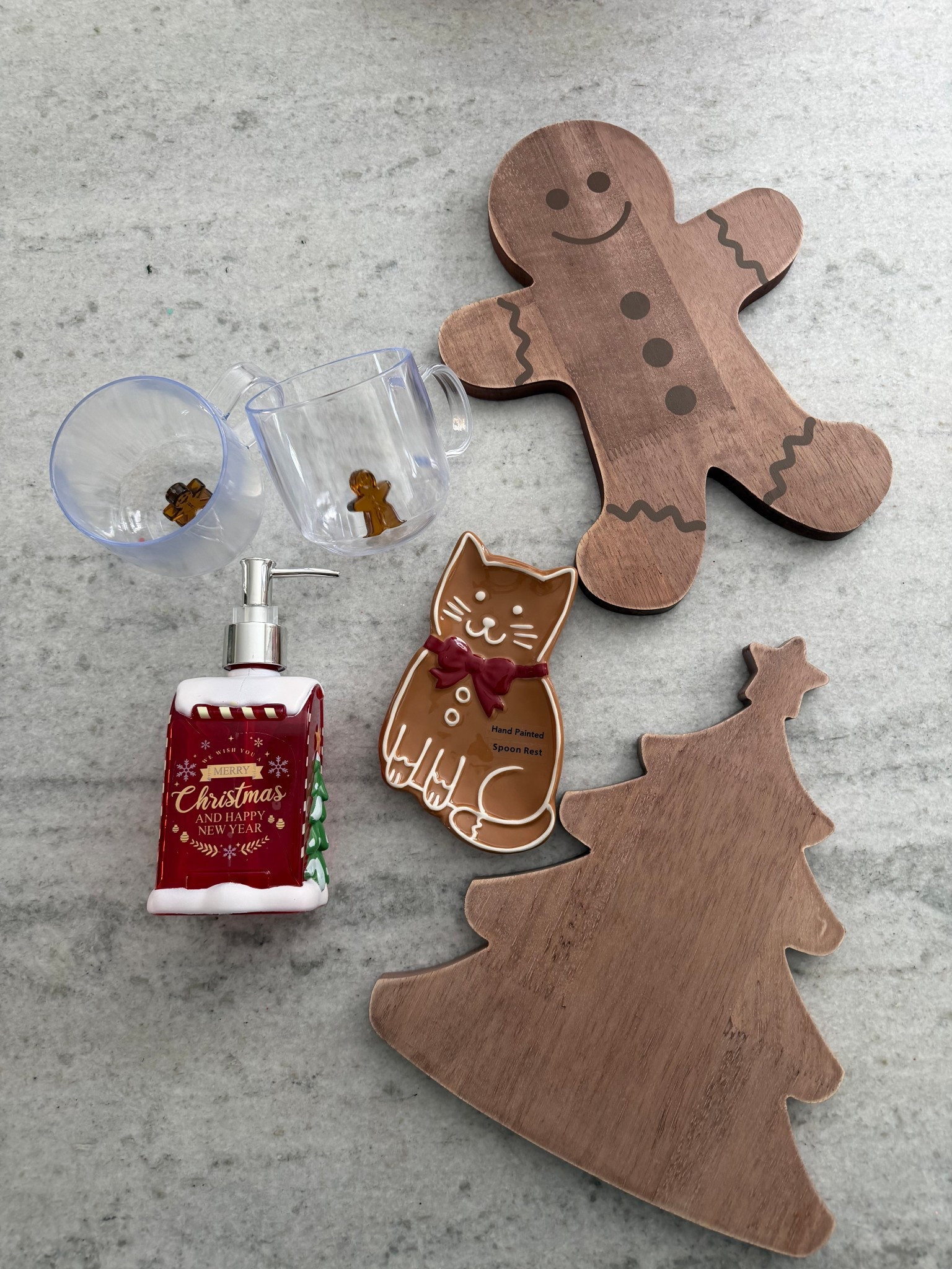 Sweeten up your kitchen for the holidays 🍪 These gingerbread-inspired finds are so fun — from the wooden cookie boards to the clear mugs with tiny gingerbread men inside. The hand-painted cat spoon rest might be my favorite cozy kitchen touch!

#ltkholiday #christmaskitchen #ltkhome #gingerbreaddecor #ltkfinds

#LTKHoliday #LTKHome #LTKGiftGuide