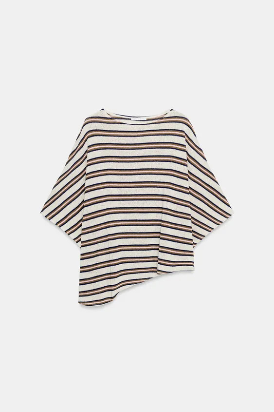 Top crafted from rustic fabric. Boat neckline and wide short sleeves. Asymmetric hem. | Zara US