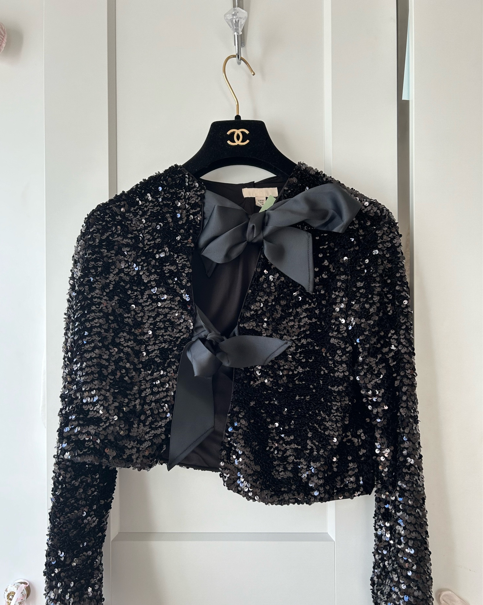 Sparkly black bow jacket 🤍✨ 

#LTKHoliday #LTKSeasonal #LTKGiftGuide