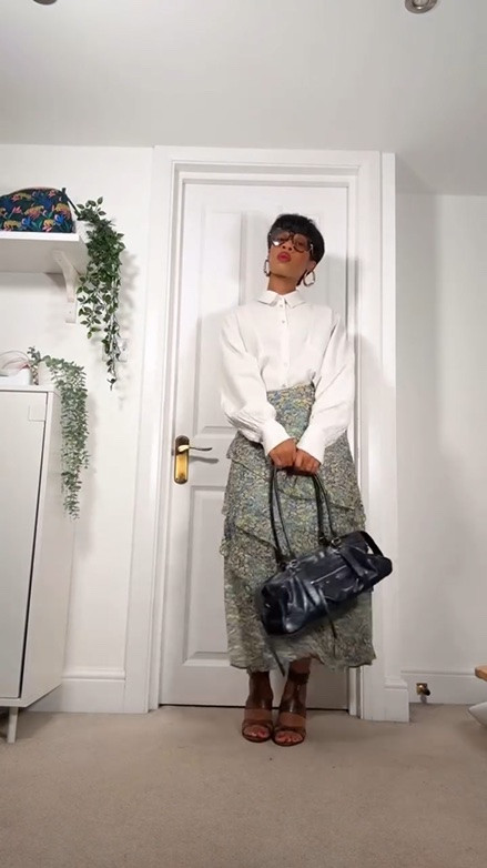 A quick GRWM for work with a spring look. The london weather has been a mess but I’m choosing to dress for the weather I’d like to see and brave it in heeled sandals!! Heels will always lift a simple blouse and skirt look! The shirt is old @topshop the skirt is @marksandspencerstyle the sunglasses are @bottegavenetaworld the bag is @urbanrevivo and the shoes are from @asos. Everything is linked in my LTK which is the blue link in my bio! 🥰 #styleover30 #personalstyle #capsulewardrobe #elevatedcasual #springworkstyle