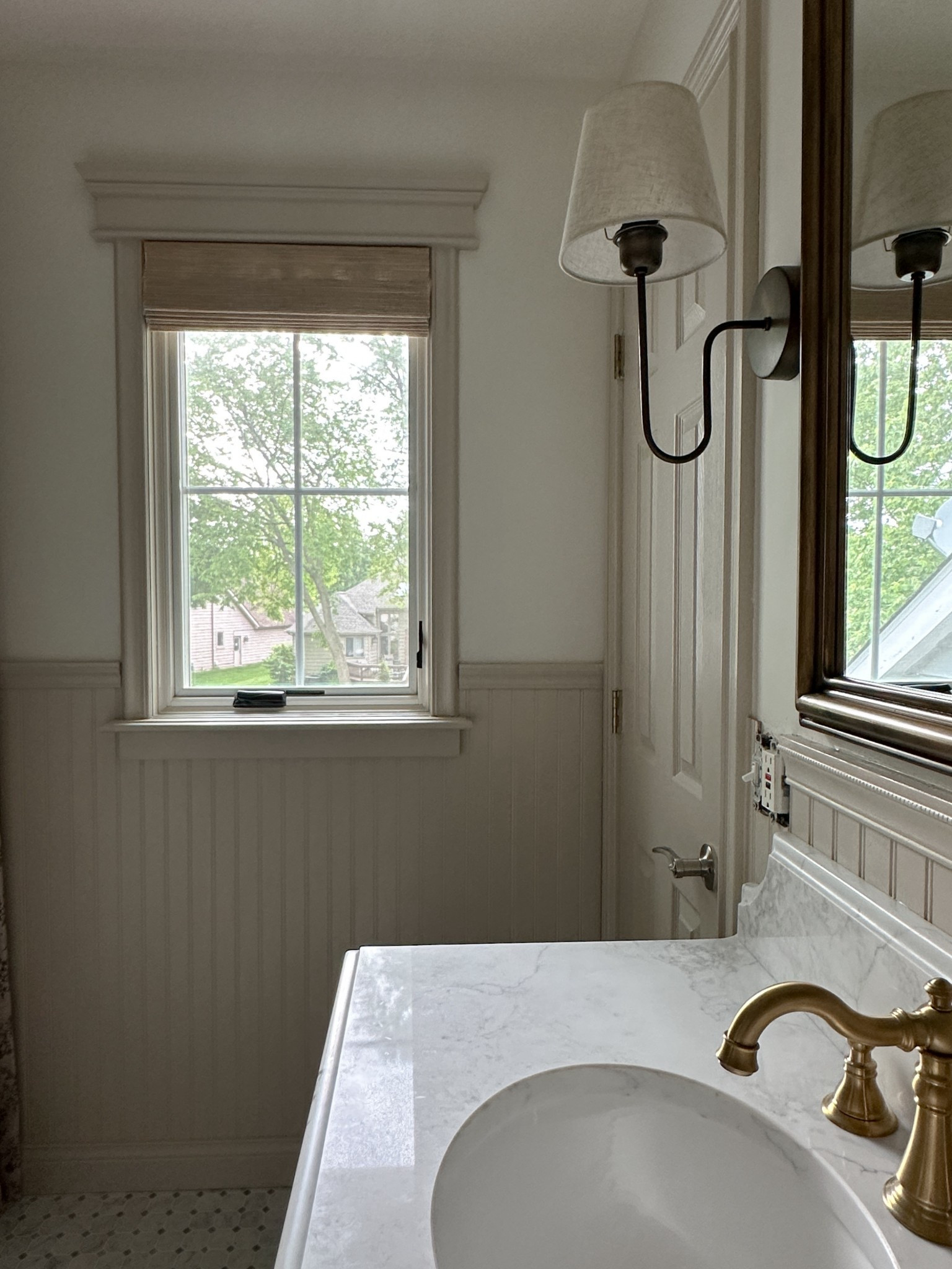 Added the most charming window trim and bamboo shade to the window in our bathroom remodel, and I couldn’t be more obsessed! It’s giving all the cozy cottage vibes 🤍

If you’re looking for something similar, you can use my code MYNINETIESHOME for 20% off the shade!

Bathroom window treatment, bamboo shade, TWOPAGES shades 

#LTKHome #LTKStyleTip