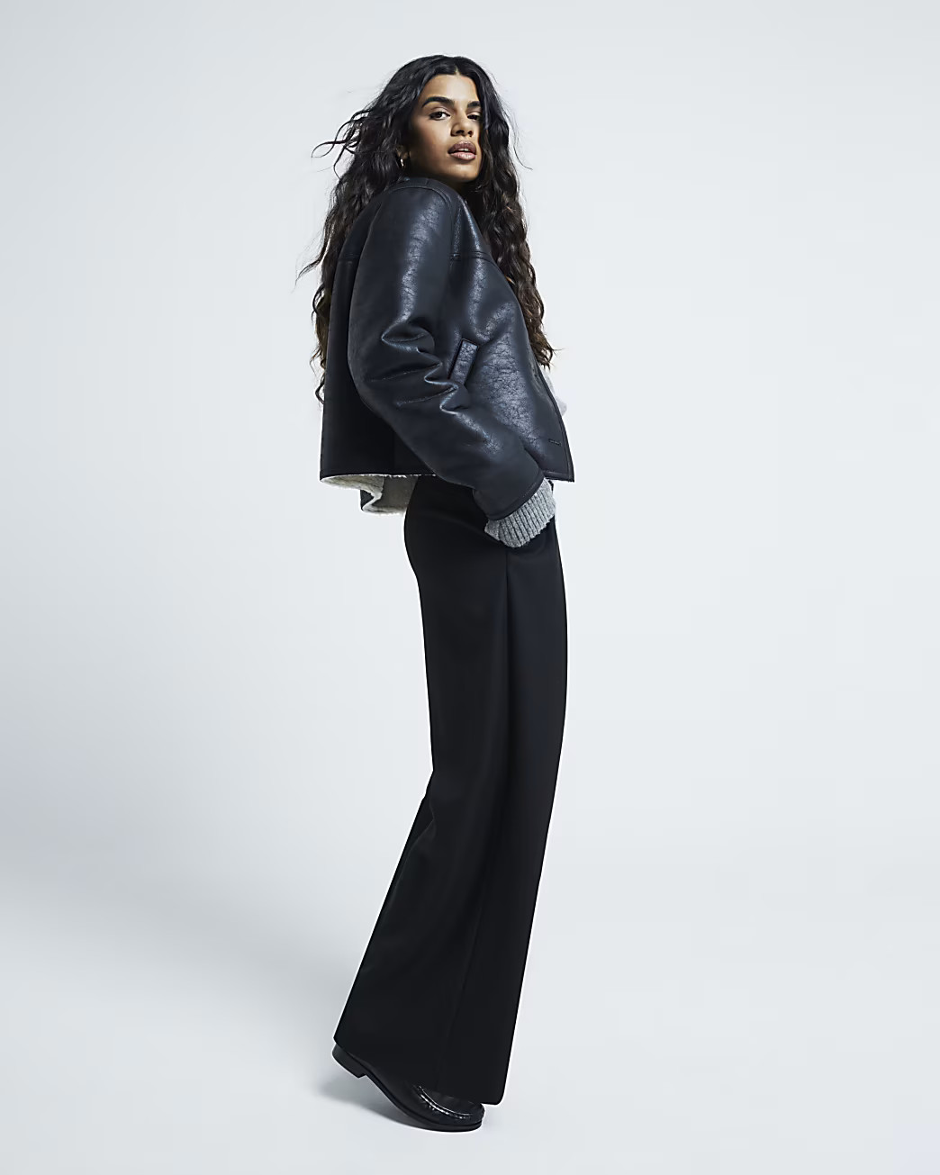 Petite Black Belted Wide Leg Trousers | River Island UK & IE