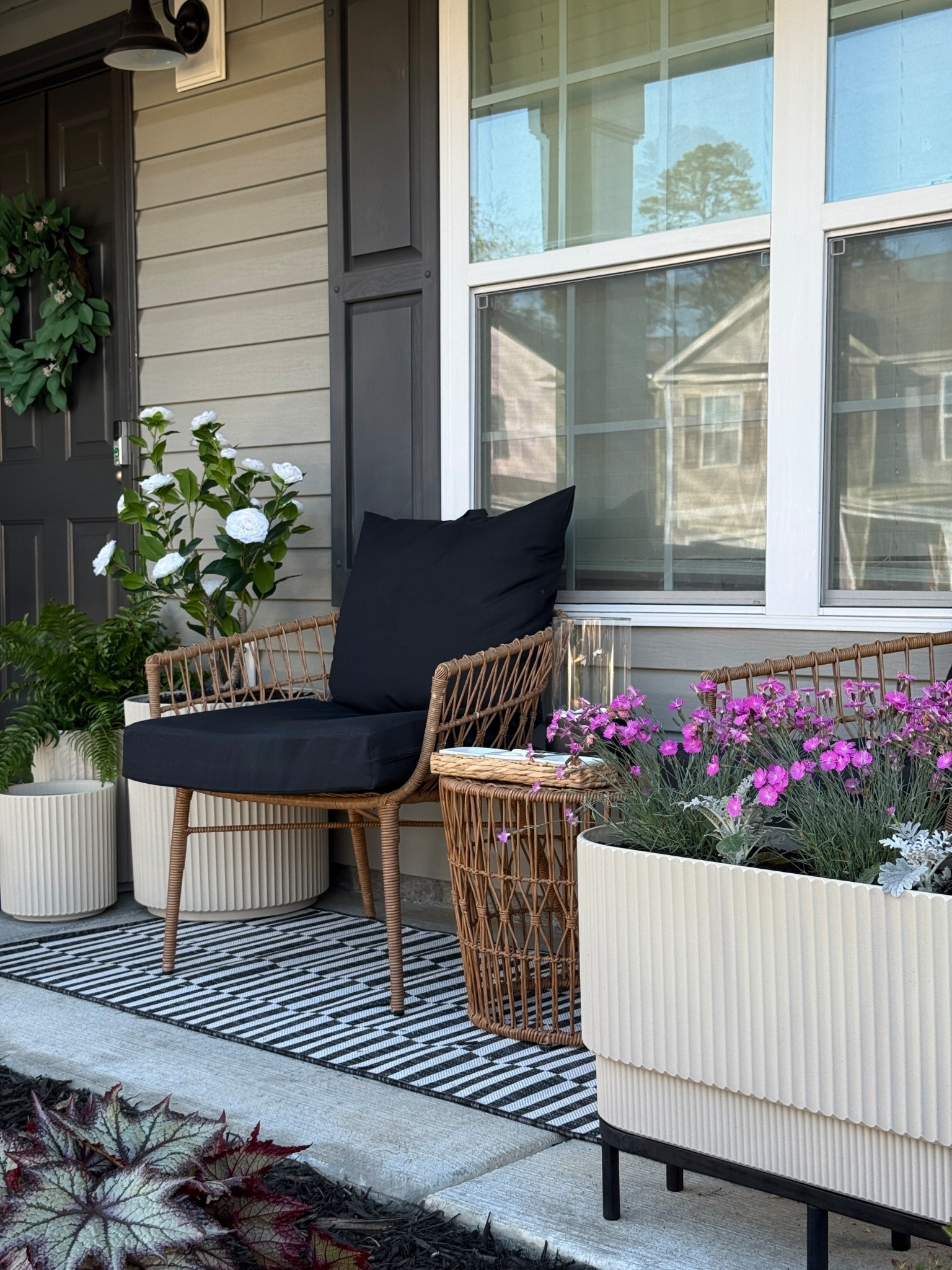 Front porch makeover! 🌿
Beige fluted patio planters, outdoor cushions, patio decor, faux outdoor plants, outdoor runner, solar fountain, Veradek planters

#LTKHome #LTKSeasonal #LTKSaleAlert