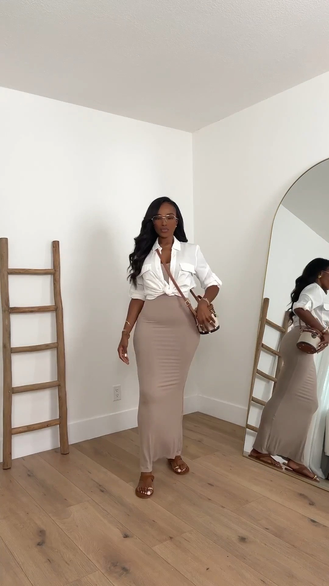 Hi Babes!

This is one of those outfits that always looks polished no matter where you're headed 🤎✨

I love the combination of the fitted mocha maxi skirt with the crisp white button-down. It gives that effortless coastal-luxury vibe while still being comfortable and easy to wear. The neutral color palette feels elevated, timeless, and incredibly flattering.

Where to wear this:
• Vacation sightseeing
• Brunch with the girls
• Weekend shopping
• Resort destinations
• Casual date nights
• Coffee runs that turn into all-day plans

The beauty of this look is how versatile every piece is. The skirt can be styled with tanks, bodysuits, or sweaters, and the white shirt is a staple you'll reach for year-round. Cost per wear on pieces like these is unmatched.

Everything is linked below.

xx Kira | IG: KirasFashionFinds

34D - 27 - 40 • Size Small or 4

#LTKgrwm #LTKootd #LTKPetite