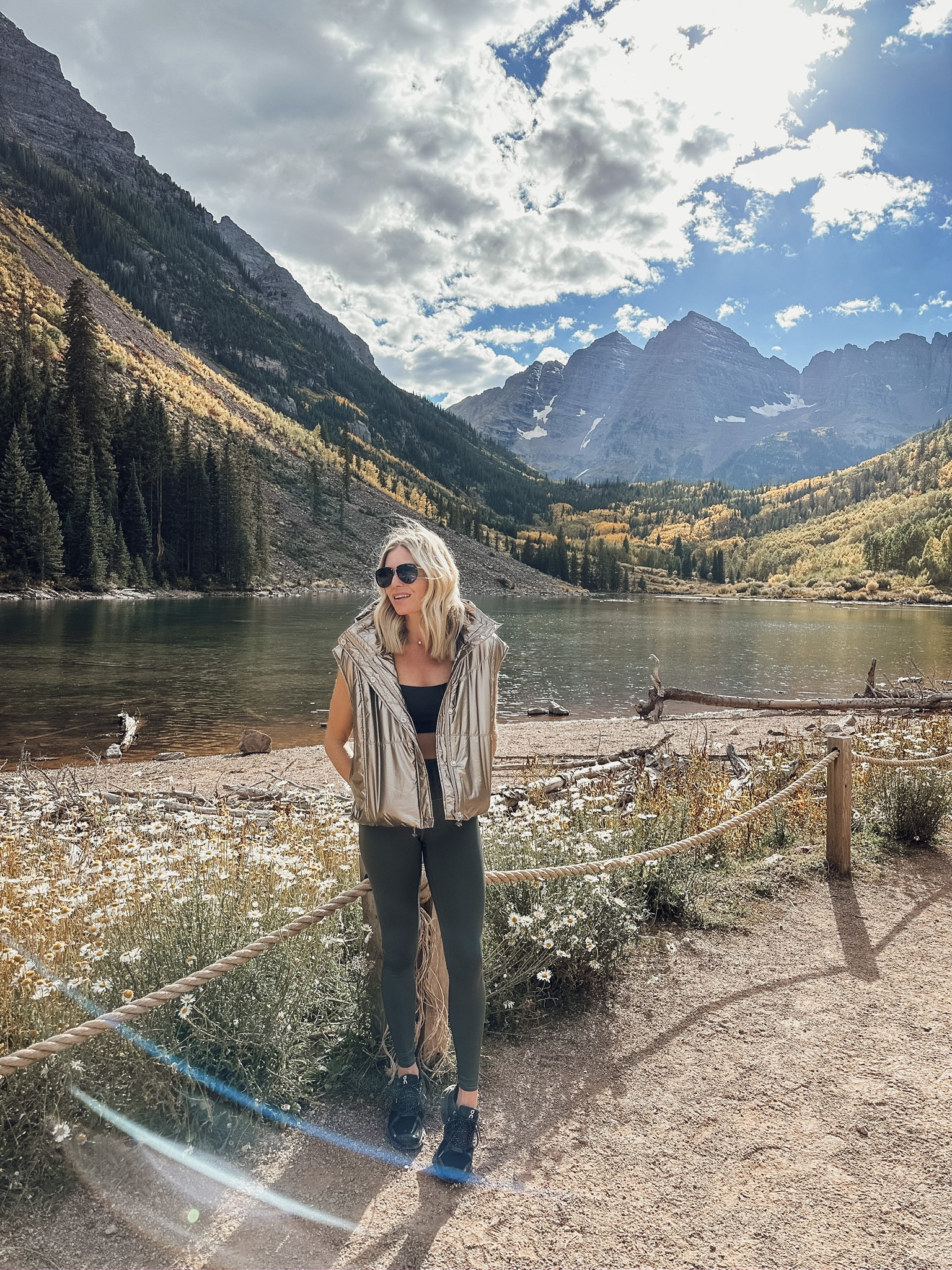 Hike look⛰️ metallic puffer vest, green alo leggings, On cloud black sneakers, black aviator sunglasses. 

#LTKfitness #LTKtravel #LTKstyletip