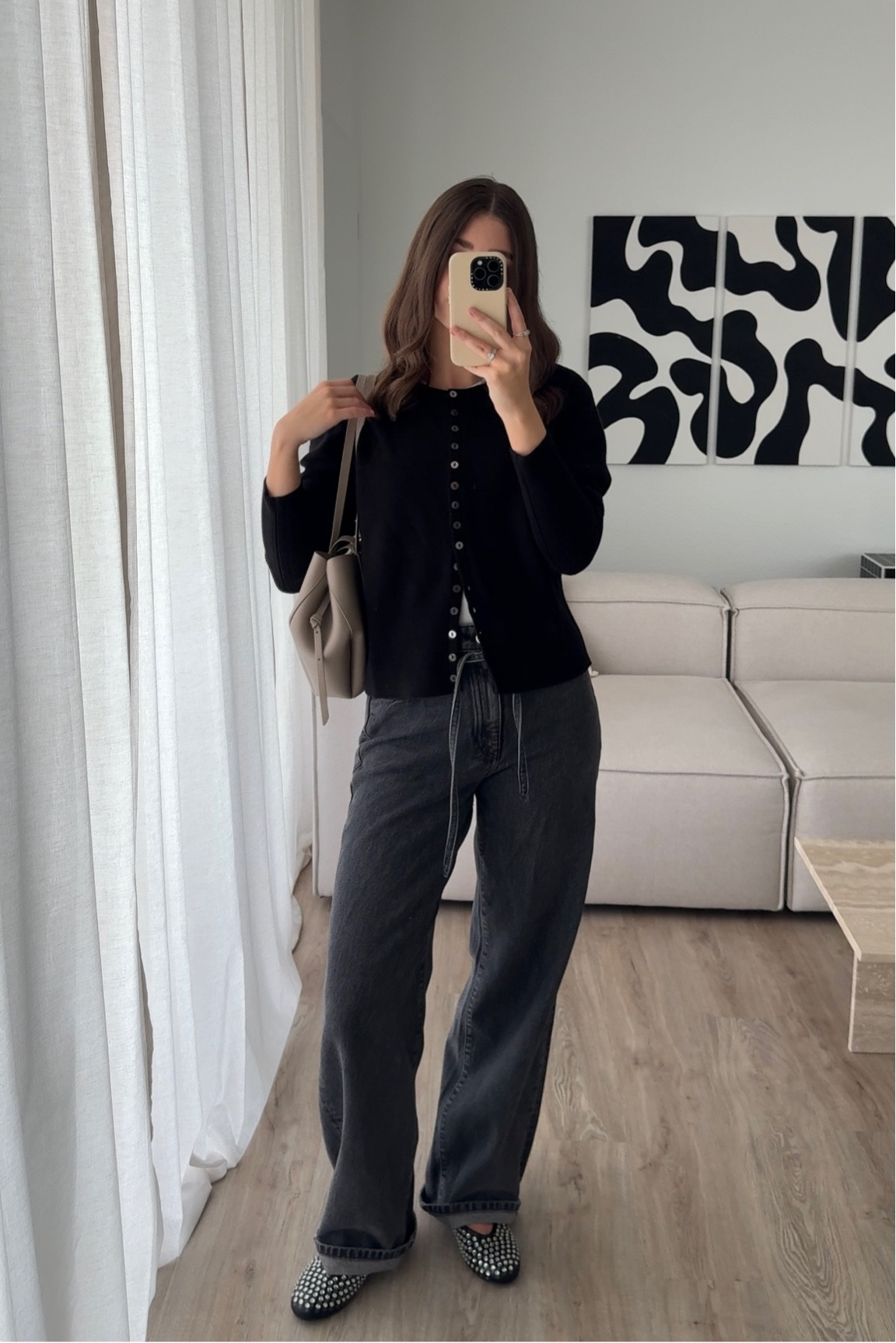 black cardigan and oversized jeans

#LTKeurope #LTKstyletip #LTKSeasonal