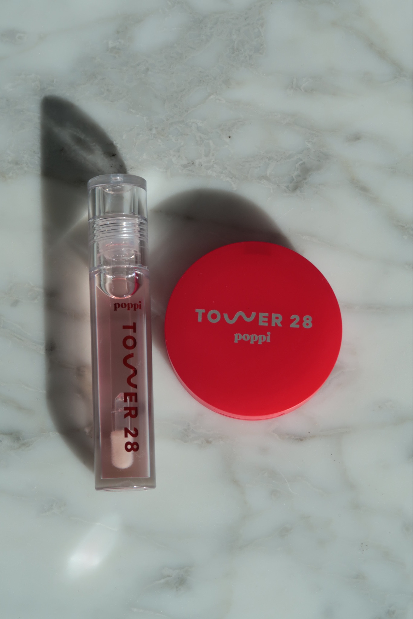 The Tower 28 × Poppi collab is pure feel-good energy — bright, glowy, and so easy to wear. The packaging feels fresh and fizzy, like a little soda moment on your vanity, while the formula inside stays true to Tower 28’s signature clean, sensitive-skin-friendly vibe. It gives you that sheer, juicy flush of colour that looks natural and healthy, never heavy.

Cranberry Fizz delivers a soft, fruit-tint glow that melts into the lips with a glossy, hydrating finish. It’s smooth, cushiony, and lightweight — the kind of gloss you can throw on anytime for instant brightness. It’s playful but still minimal, making it perfect for everyday wear, bare-face days, and effortless clean-girl makeup looks.

This collab captures the best of both brands: Poppi’s fun, uplifting personality with Tower 28’s dewy simplicity. A small little pick-me-up that adds glow, hydration, and a bit of sparkle to your routine.

Hashtags
#Tower28Beauty #PoppiCollab #FizzFrost #CranberryFizz #CleanBeauty #JuicyLipLook #MinimalMakeup #GlowyBeauty #BeautyTok #SoftGlow #AestheticBeauty #GlossyLipLook

#LTKHoliday #LTKGiftGuide #LTKBeauty