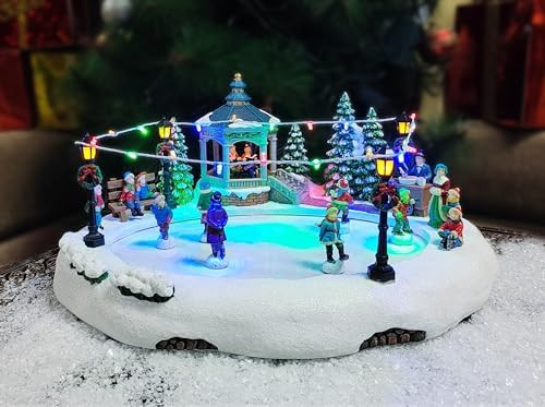 MOMENTS IN TIME Animated Skating Pond 7.28”H LED Christmas Village Display with Moving Skaters,... | Amazon (US)