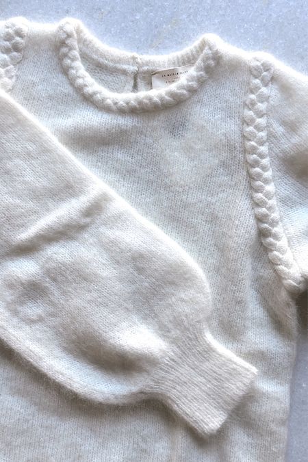 sezane annita ecru jumper, white sweater, neutrals, closet staples, Wool and kid mohair jumper with long, slightly puffed sleeves
Beaded rib knit and braid along armhole and neckline
Braided finish at armholes and neckline, fall / winter

#LTKSeasonal #LTKstyletip #LTKworkwear