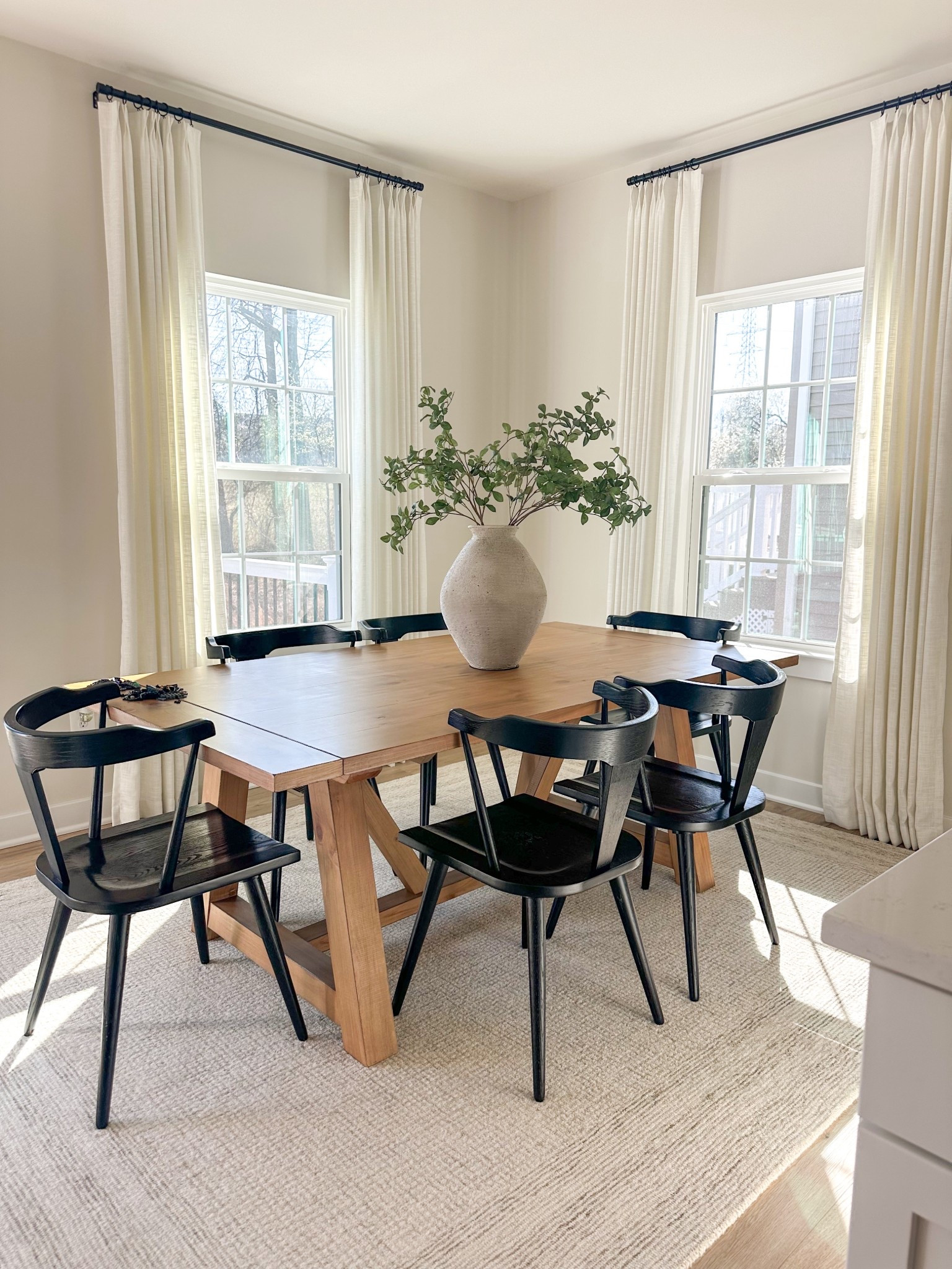 Neutral, classic and timeless dining room
#diningroom #diningchairs #curtains #rug #diningtable 

#LTKHome
