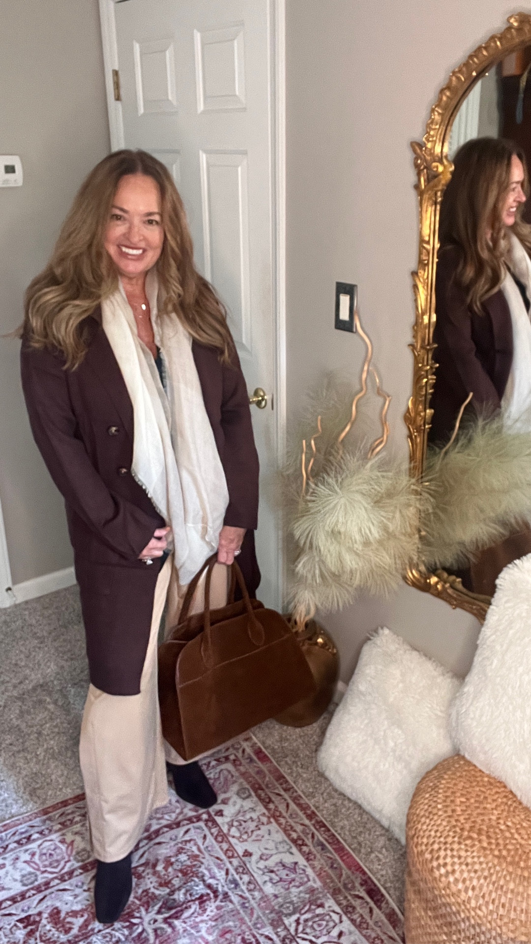 An elegant long double breasted chocolate brown cardigan. Perfect for Fall weather. A great cardigan for workwear and Football games. 

#LTKStyleTip #LTKWorkwear #LTKSeasonal