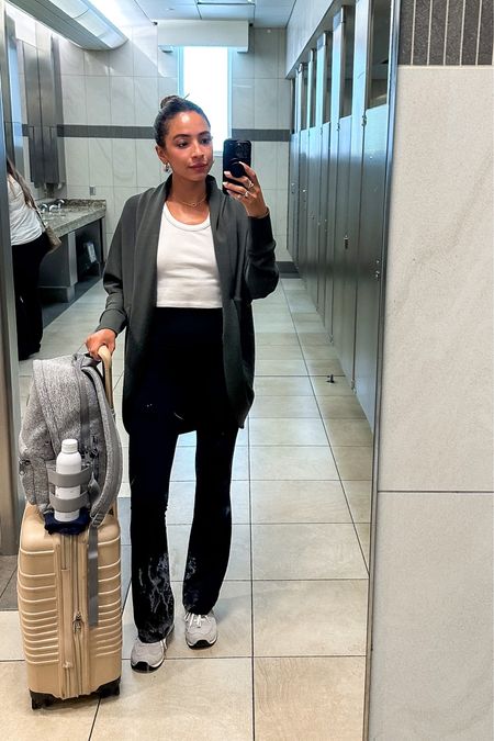 Travel outfit! Wearing a size XS/S in spanx olive cardigan, size 4 in black lululemon flare leggings , size Small in white tank and new balance sneakers fit tts. Use code NENA20 to save on Dagne Dover!





Travel outfit
Airport outfit
Athleisure outfit
Comfy outfit
Casual outfit
Lululemon leggings
Beis luggage
Travel backpack
Dagne Dover backpack

#LTKunder100 #LTKstyletip #LTKtravel