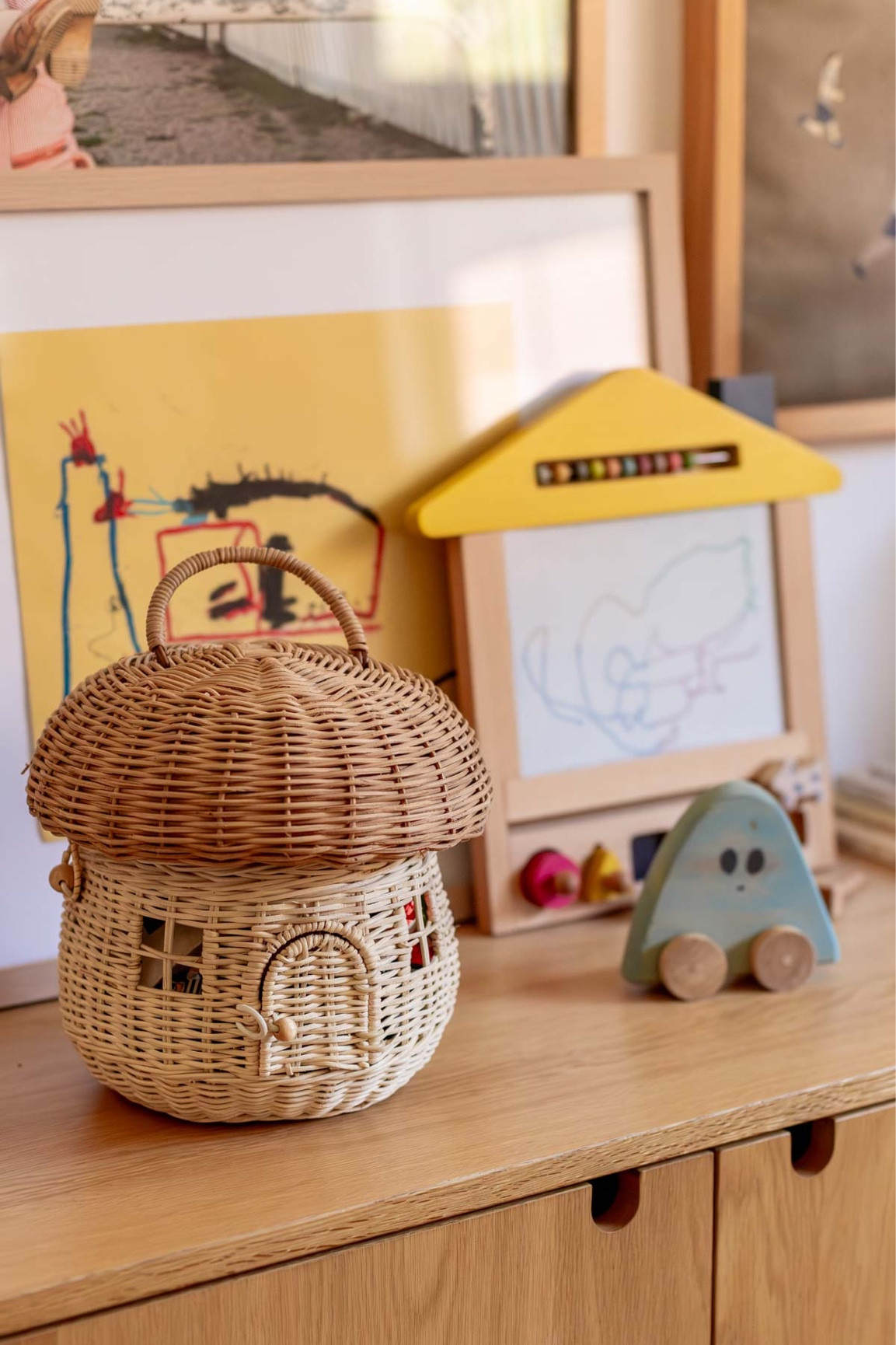 Cleaned up something’s in Hayes’ room this morning. And filled the mushroom basket to the brim with legos and other tiny things. 🤪 Wooden toys - mushroom basket - neutral kids room - gender neutral nursery - Montessori- kids drawing board - kids art frames 

#LTKfamily #LTKhome #LTKkids