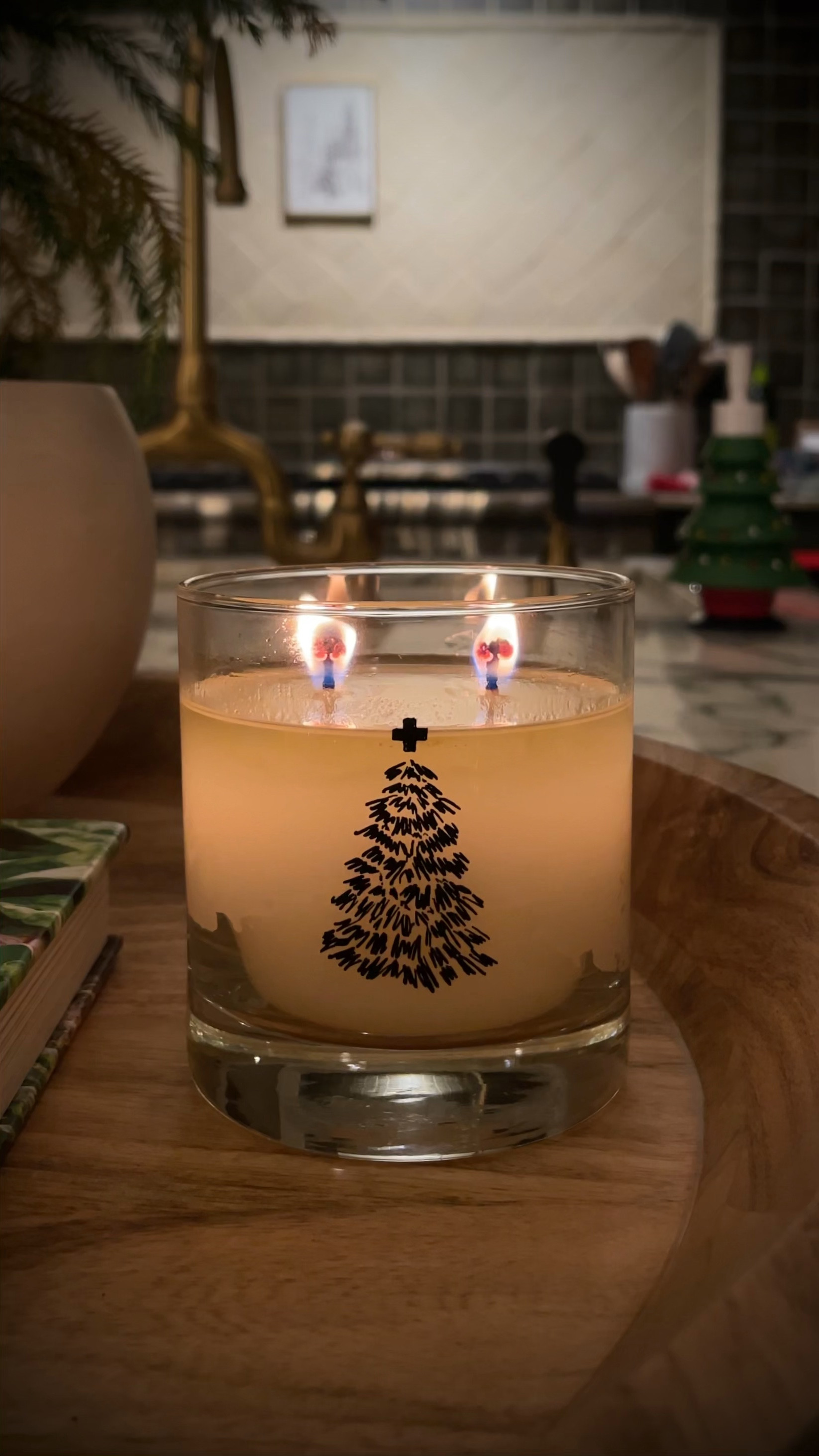 I may be bias but I PROMISE I’m not just saying it, this is the BEST Christmas candle. And after you are done burning it, you can clean it out and it becomes a very cute Christmas cocktail glass.  #merrychristmas🎄♥️

#LTKhome #LTKSeasonal #LTKfindsunder100
