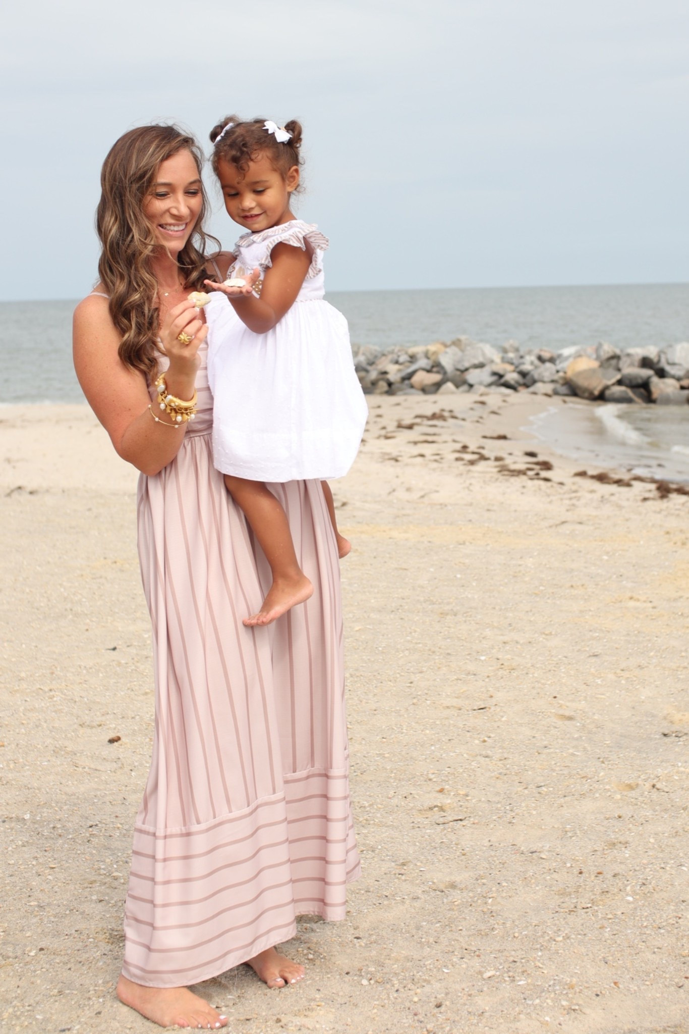 Two girls who love the shore // earth tones // beach dresses // beach vacation family photos

#LTKmomlife #LTKSeasonal #LTKKids