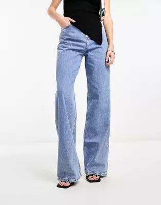 Calvin Klein Jeans high waisted relaxed jeans in mid wash | ASOS | ASOS (Global)