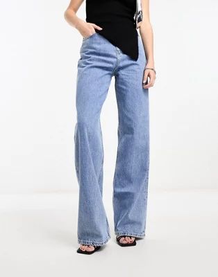 Calvin Klein Jeans high waisted relaxed jeans in mid wash | ASOS | ASOS (Global)