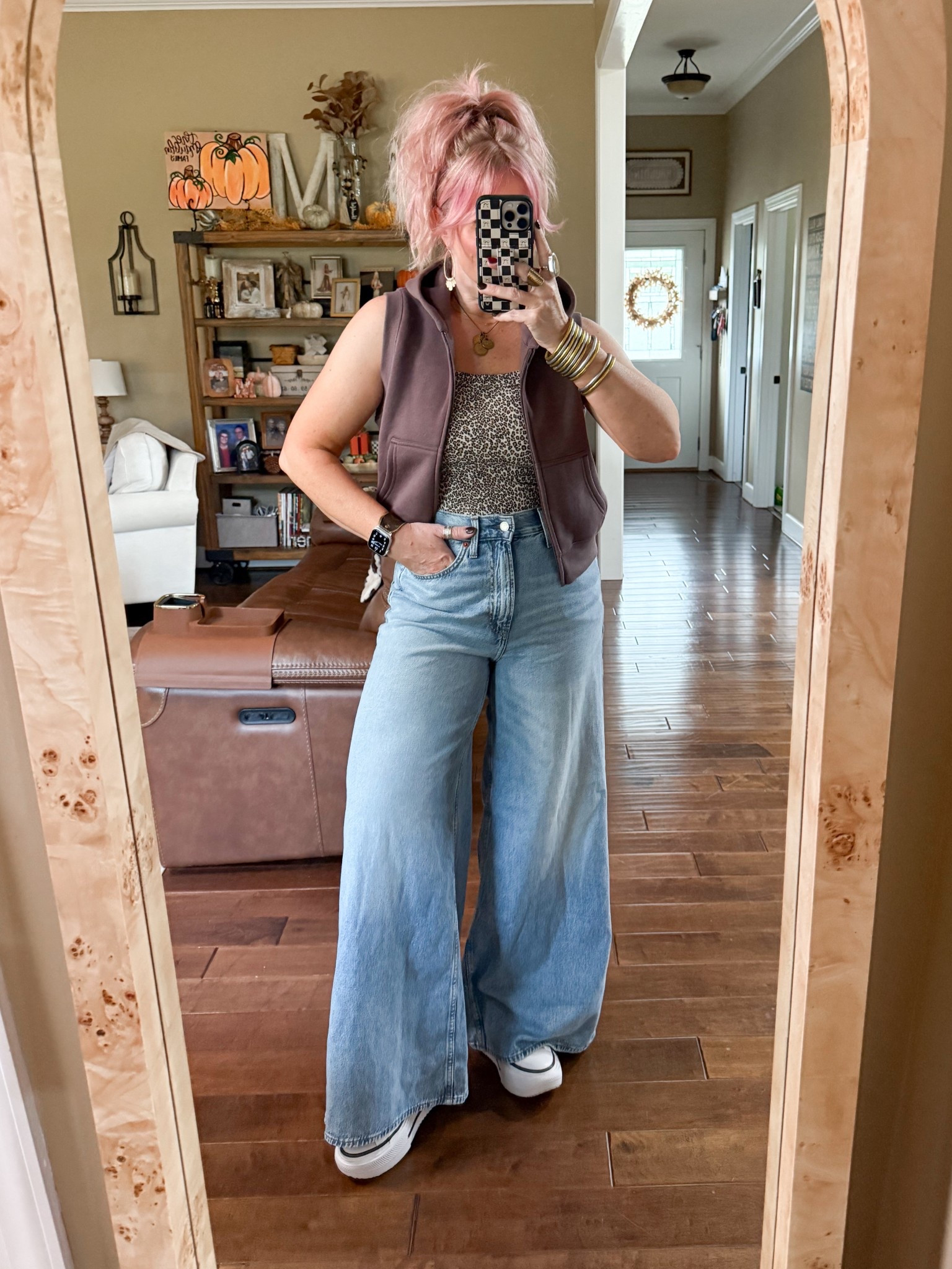 This hoodie vest is adorable and so cute with a tee and tank! I’m wearing a medium in it and this leopard tank too. My jeans are a size 8  

#LTKFindsUnder50 #LTKStyleTip #LTKOver40